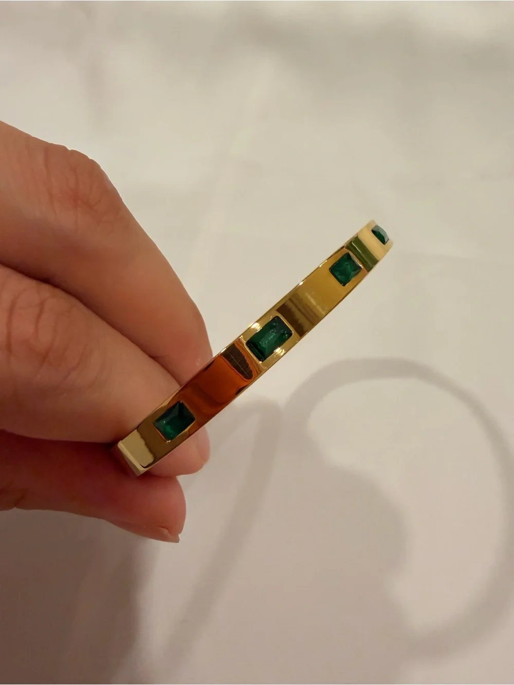 Gold Bangle with Emerald Green Accents